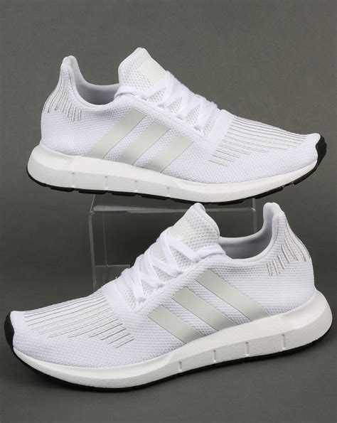 adidas weiß sneaker|Adidas white athletic shoes.